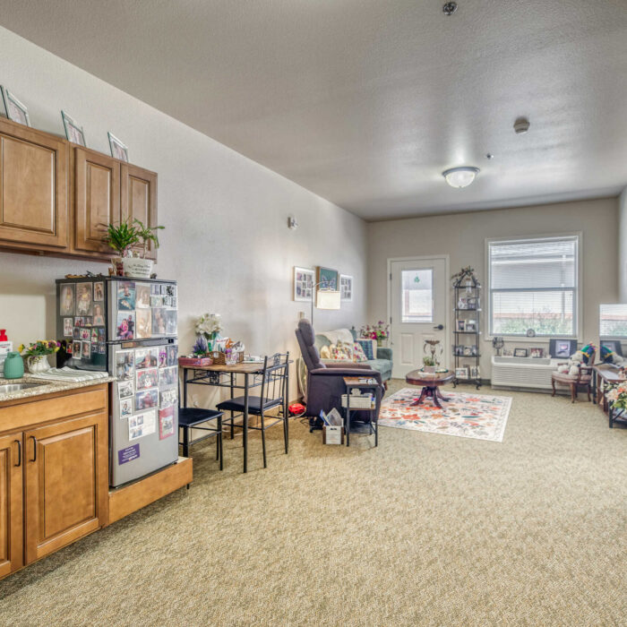Grace Assisted Living apartment with kitchenette and personalized decor